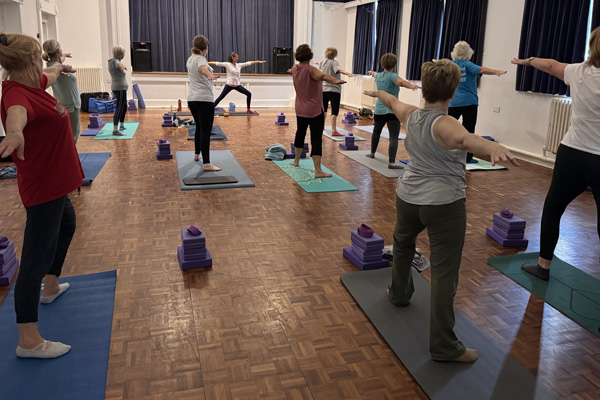 People in a yoga class in the Hall