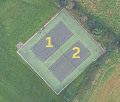 Arial view of tennis courts with numbers 1 and 2